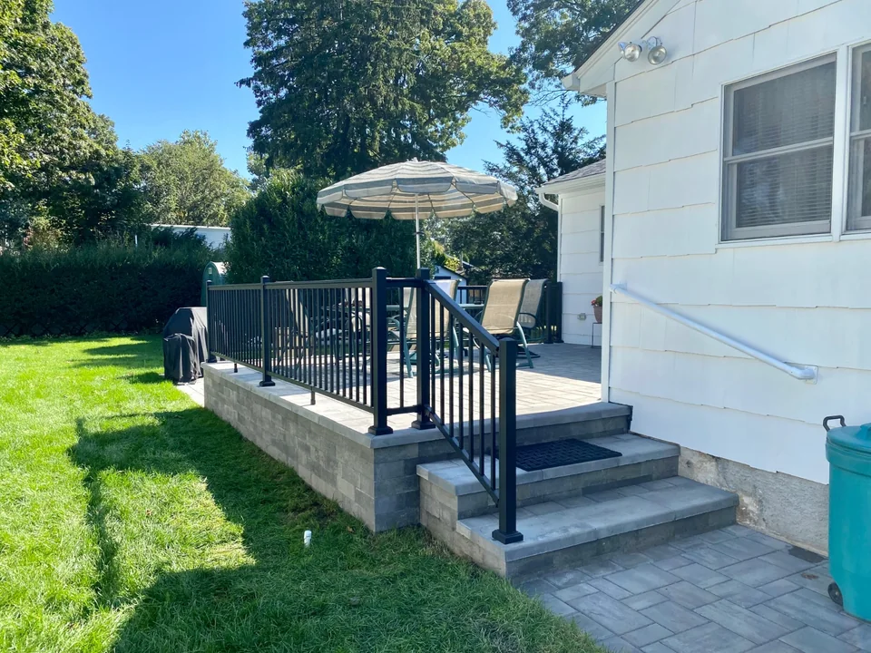 Black aluminum railing at the Bellport, New York home
