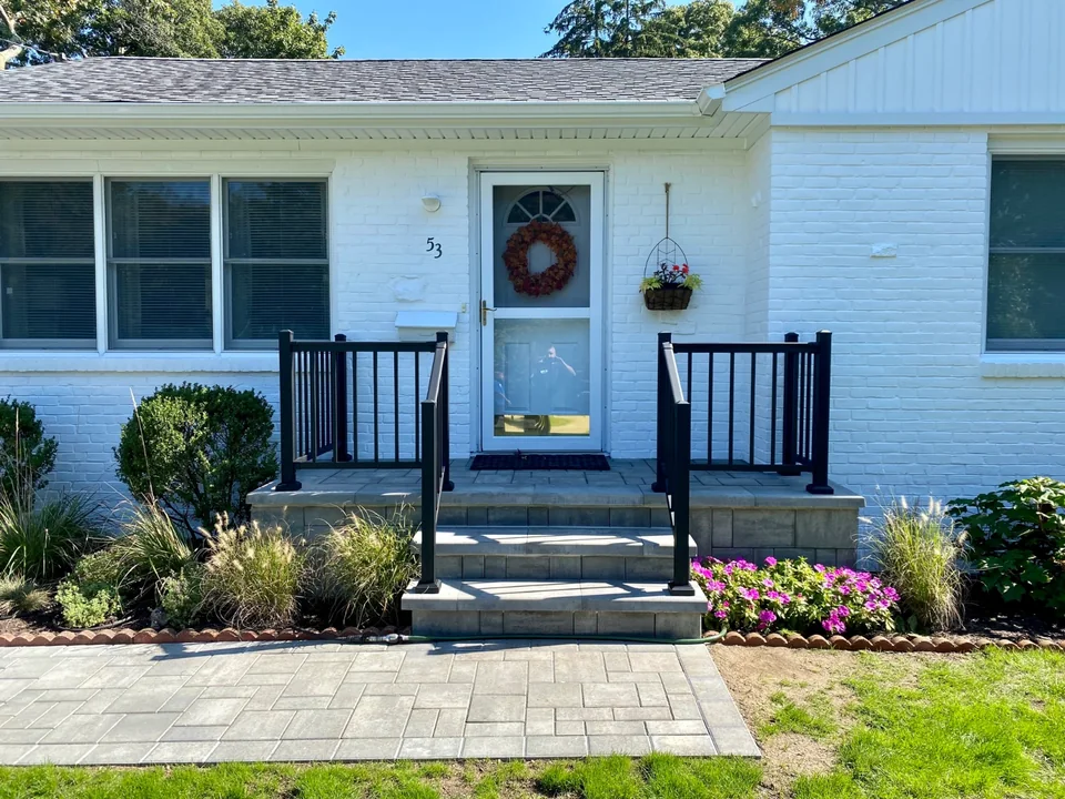 Black aluminum railing at the Bellport, New York home