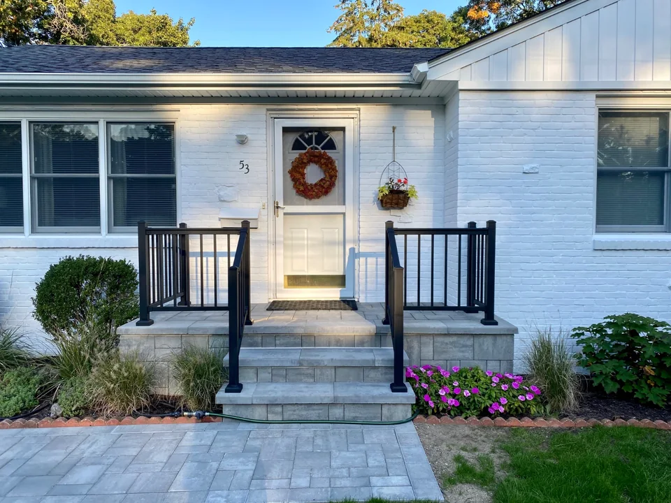 Black aluminum railing at the Bellport, New York home