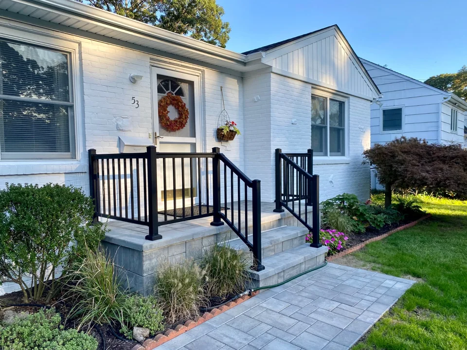 Black aluminum railing at the Bellport, New York home