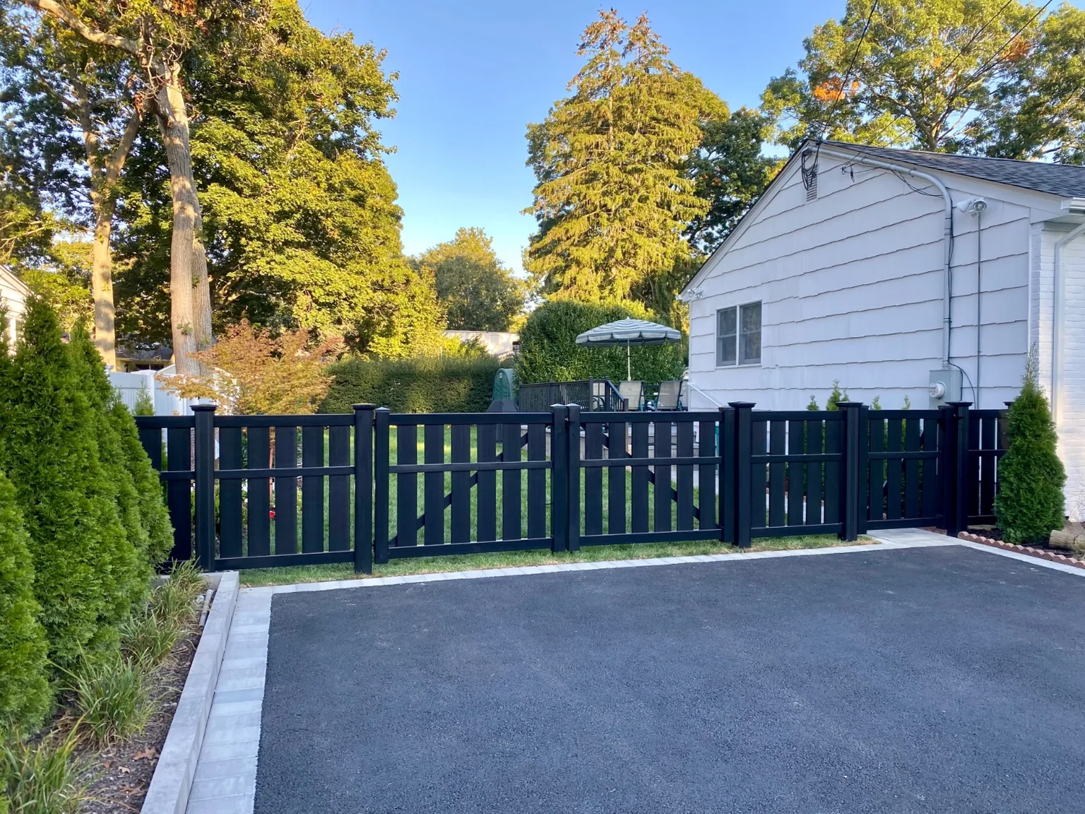 Four-foot Blackline HHP semi-privacy fence at a Bellport home