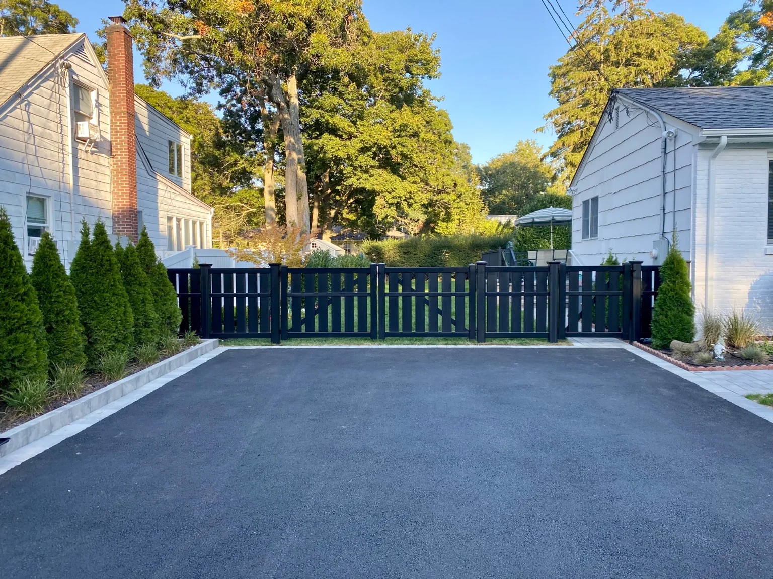 Four-foot Blackline HHP semi-privacy fence at a Bellport home
