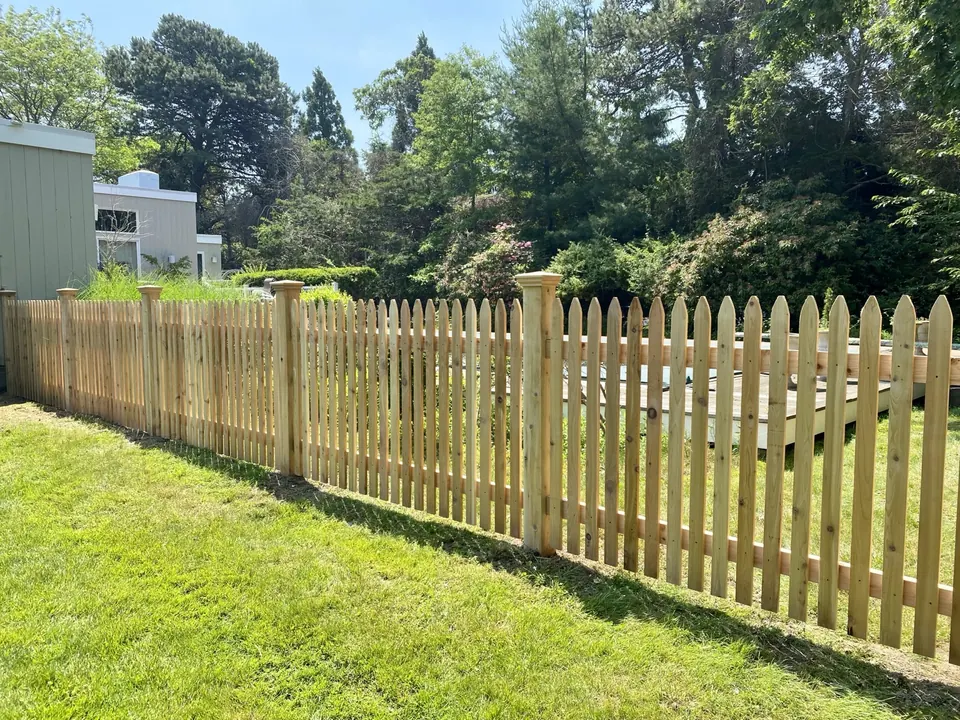 Side elevation — picket spacing and post scale matched to the original fence
