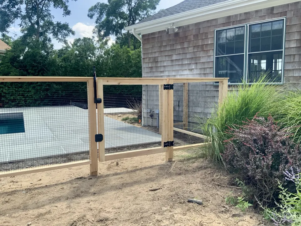 Self-closing cedar pool gate, hung to pool-code requirements