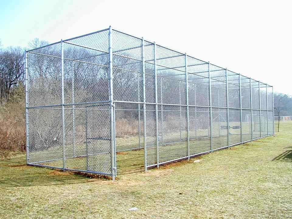 Full-height galvanized chain link batting cage enclosure