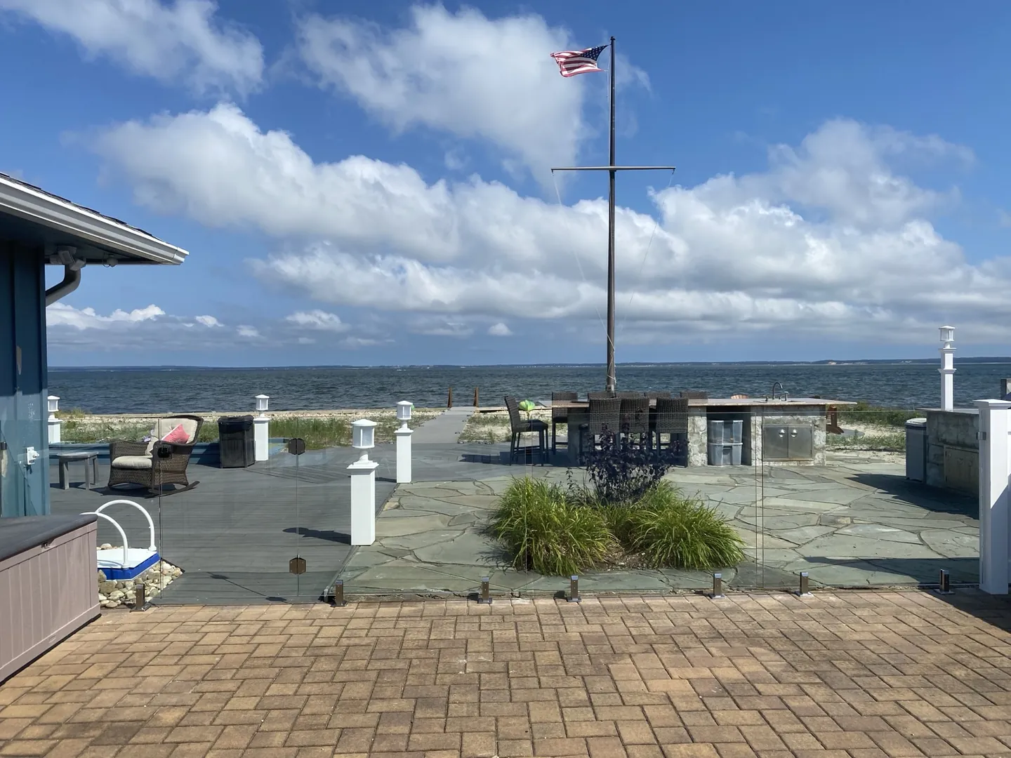 Waterfront frameless glass pool fence in Southold New York