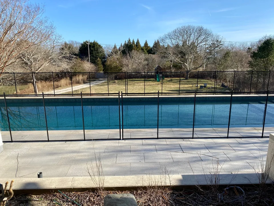 View through black Guardian Premier mesh toward the open Montauk landscape