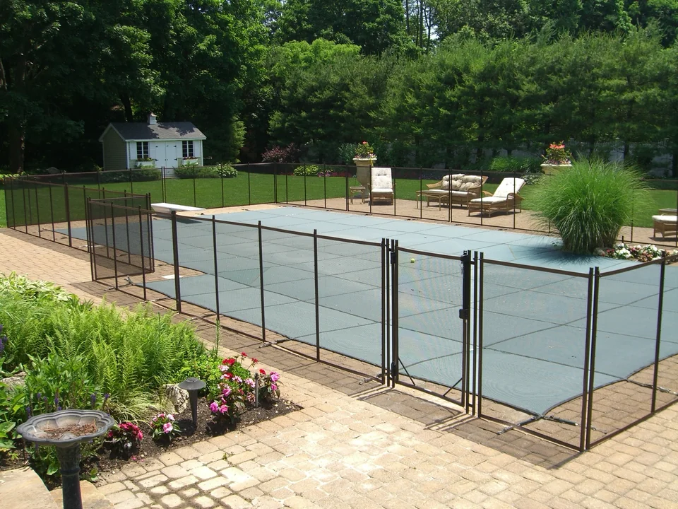 Guardian Premier removable pool fence gate at a Melville, New York swimming pool