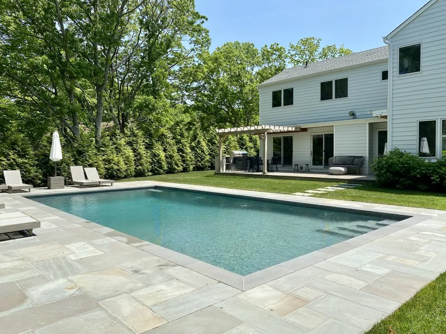 Same Sag Harbor pool area shown without the Guardian fence for comparison