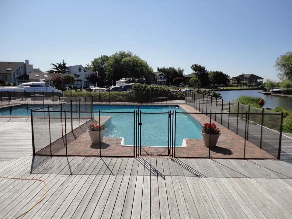 Waterfront Pool & Perimeter Fencing in East Islip, NY