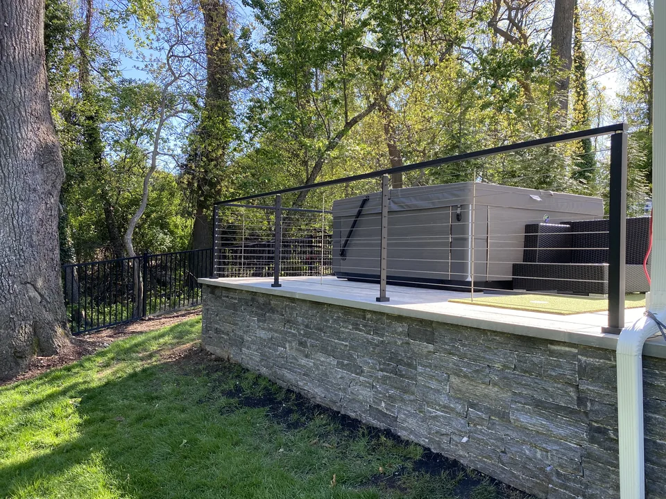 The corner return, carried around the edge of the raised terrace