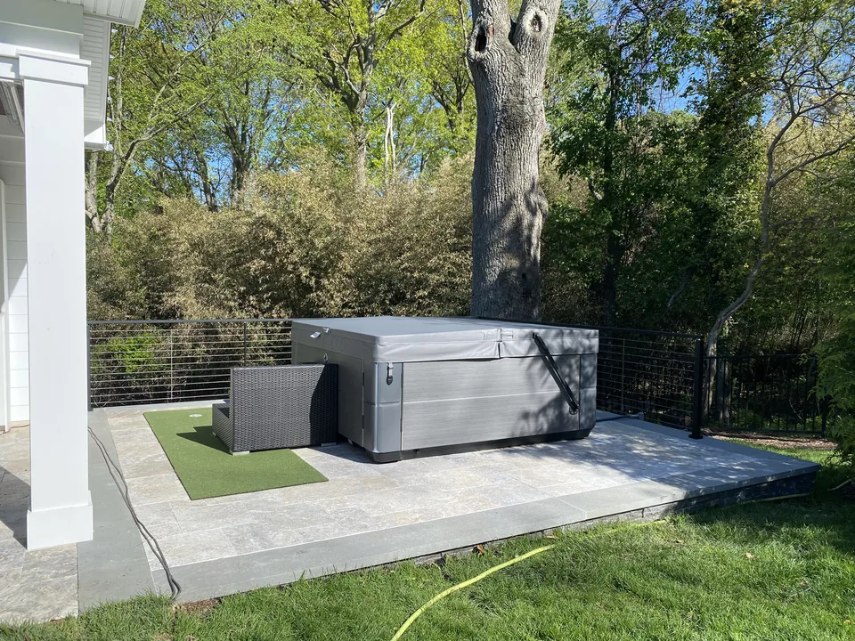 The finished terrace beneath the mature oak the layout was planned around