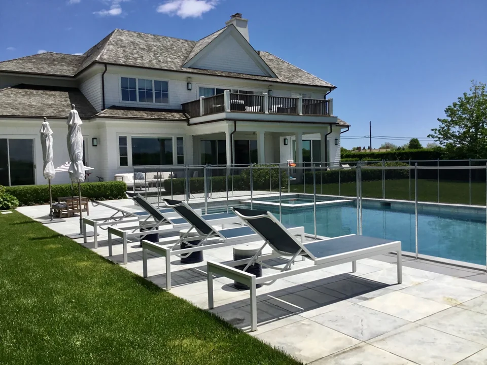 Removable child-safety pool fence beside a Southampton patio