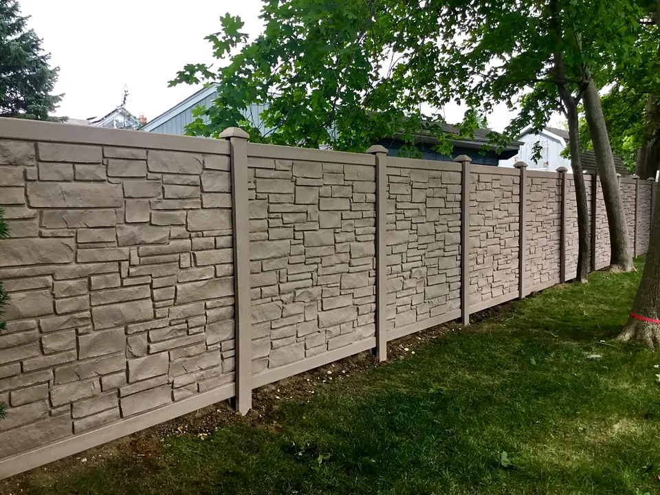 Close perspective of molded stone texture on a SimTek privacy fence