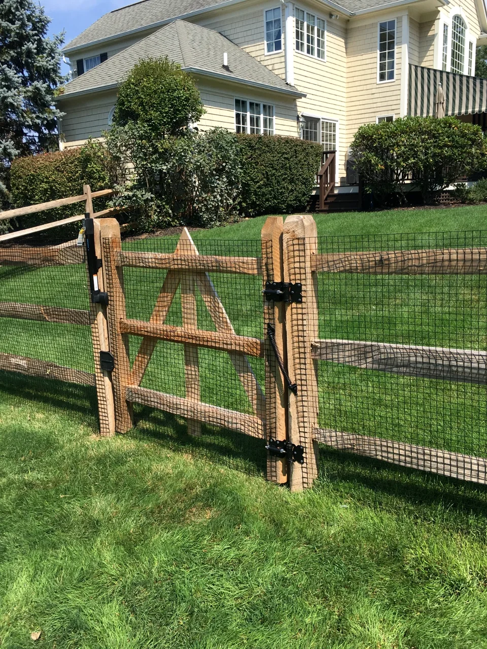 Split rail fence with wire in Southold, New York.