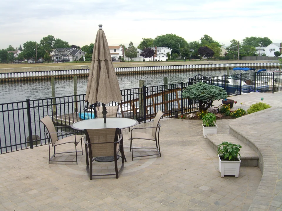 Black aluminum fence and railings at a waterfront property in Seaford, New York