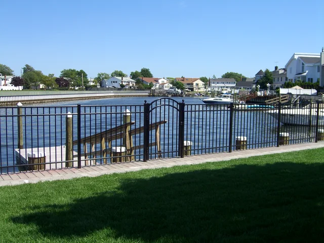 Waterfront Aluminum Fence on a Wood Bulkhead in Seaford, New York