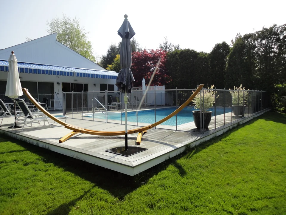 4' Guardian Vanishing Pool Fence in a Trex Deck — Westhampton, NY